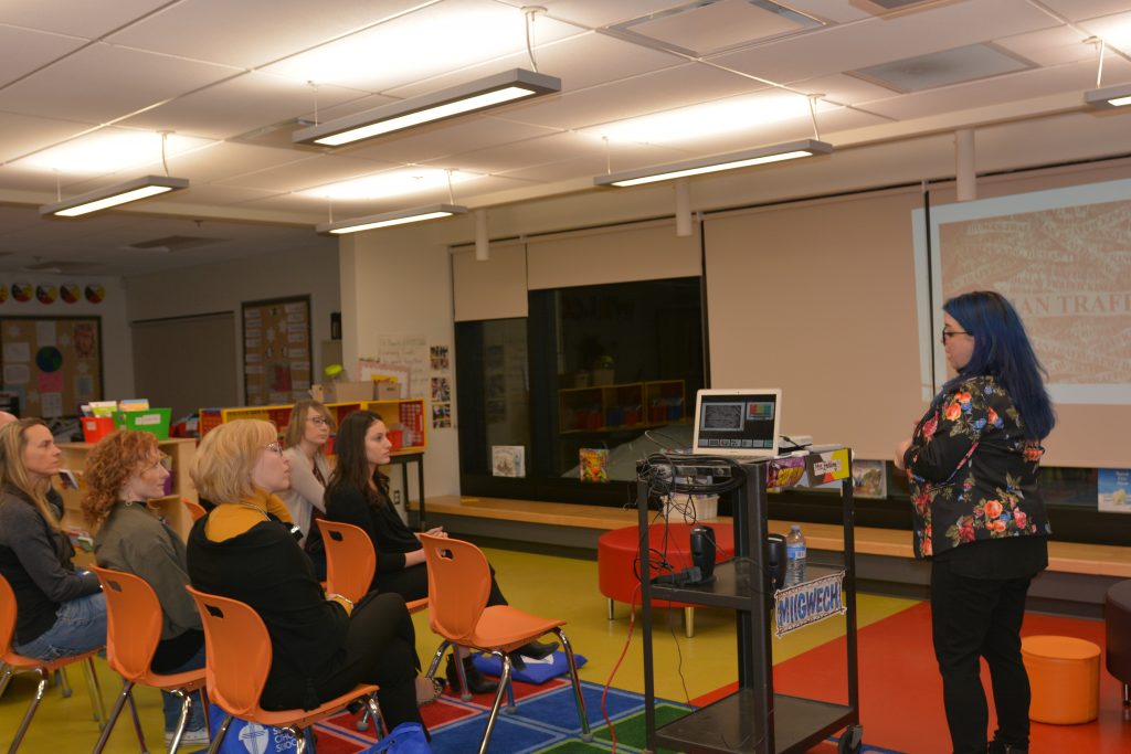 a group of parents engage in a session dedicated to learning about Human Trafficking. 