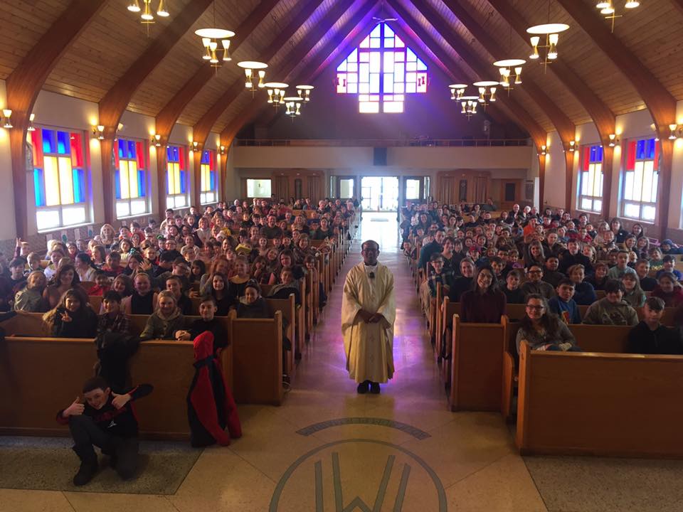 St. Anne School completes a mass at Our Lady of Peace Church.