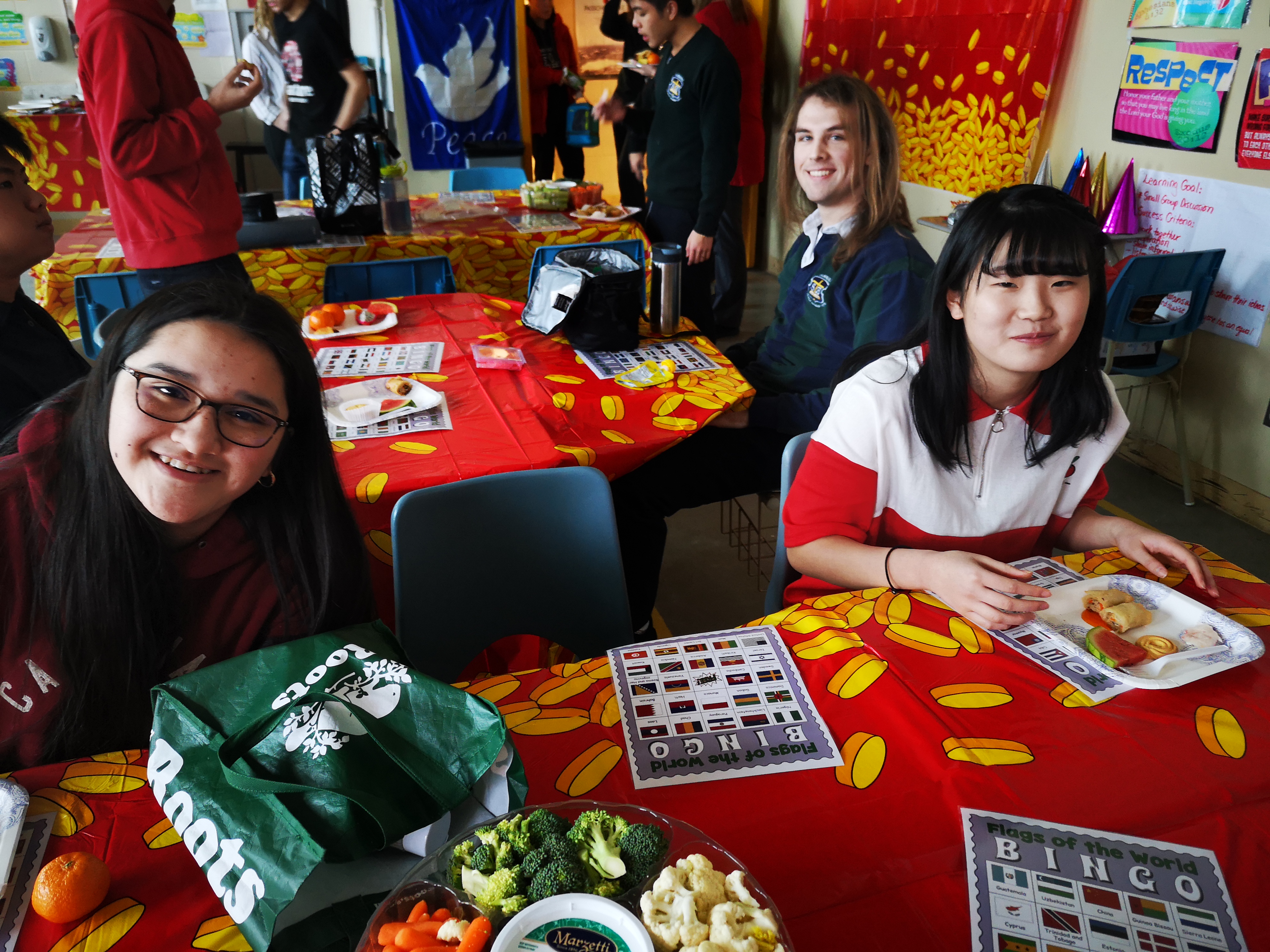 Olivia Daroczi, new student Rina Nagashima and Thomas West get in on the Chinese new year festivities.