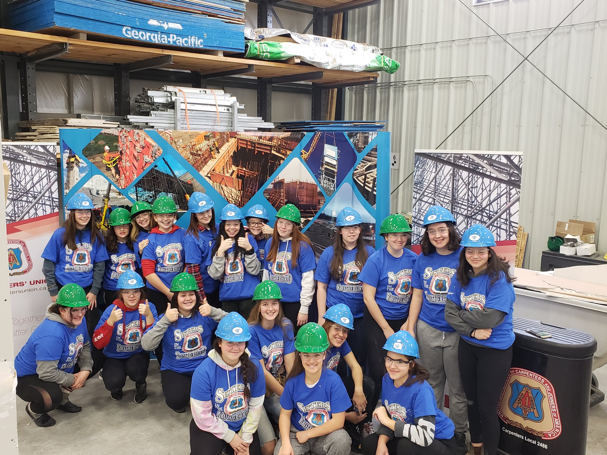 Group of girls in their construction gear.