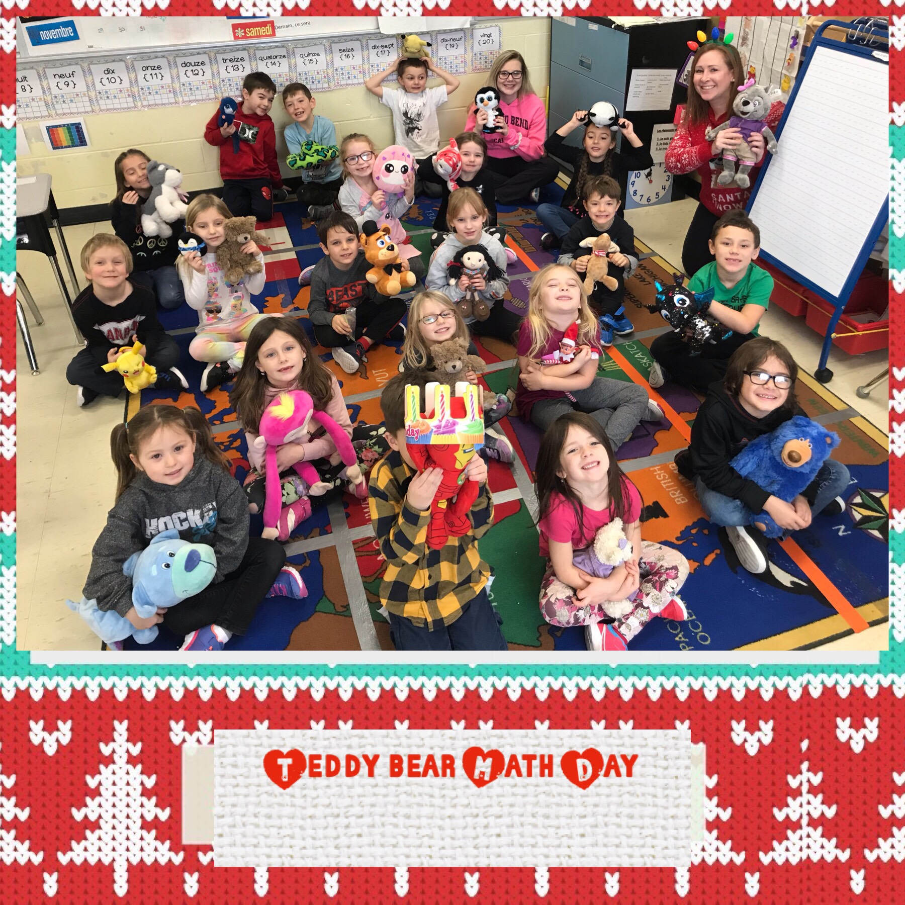 Students hold their teddy bears