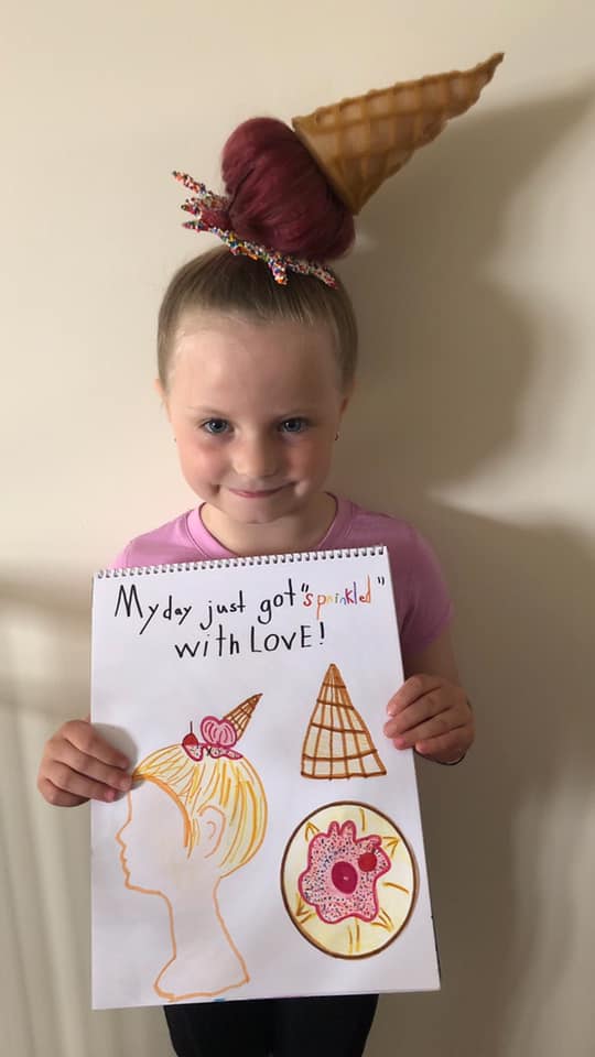 Girl wears ice cream themed hair.