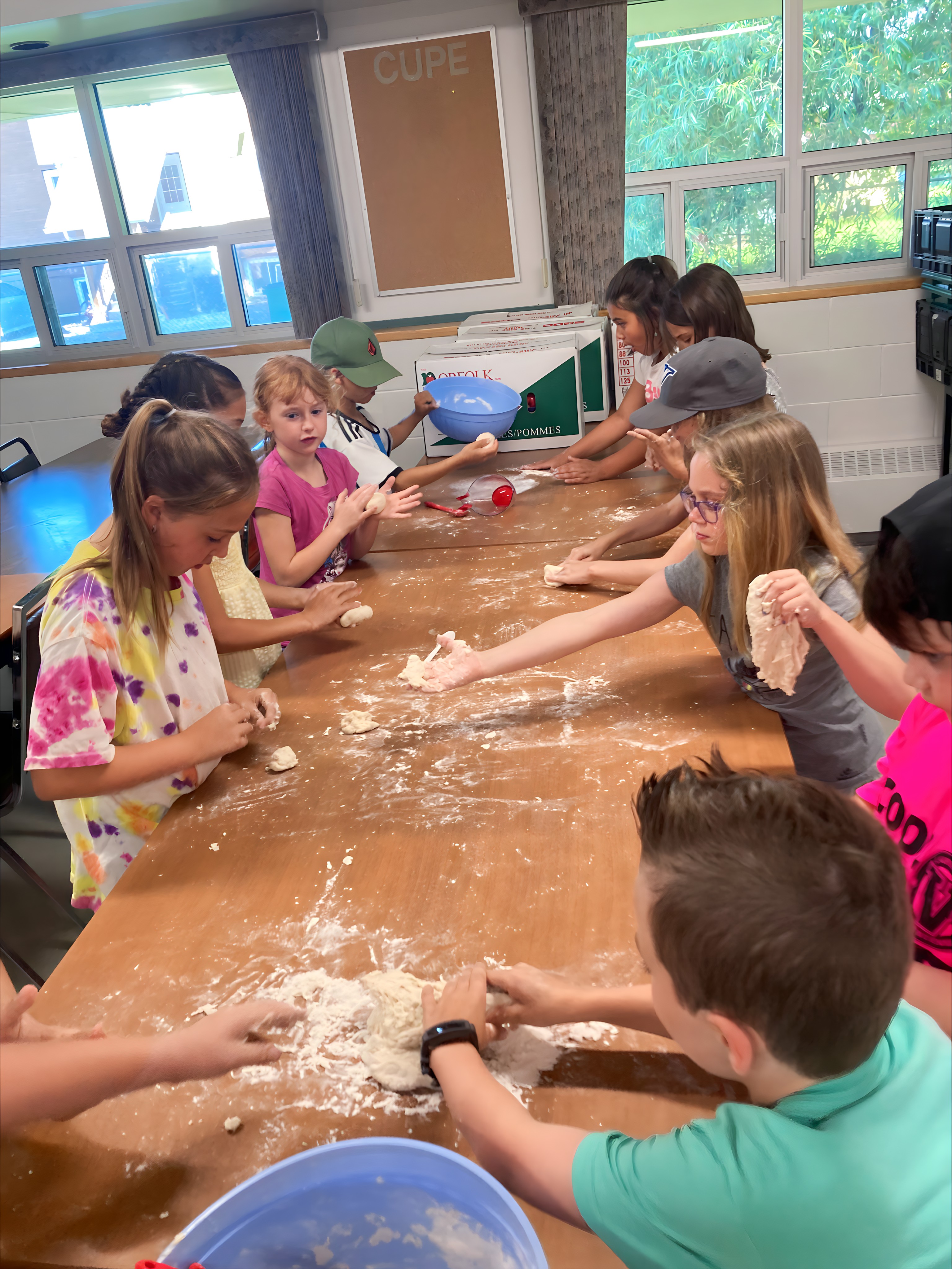 St. Charles School Students Make Bannock to Celebrate National Indigenous Peoples Day